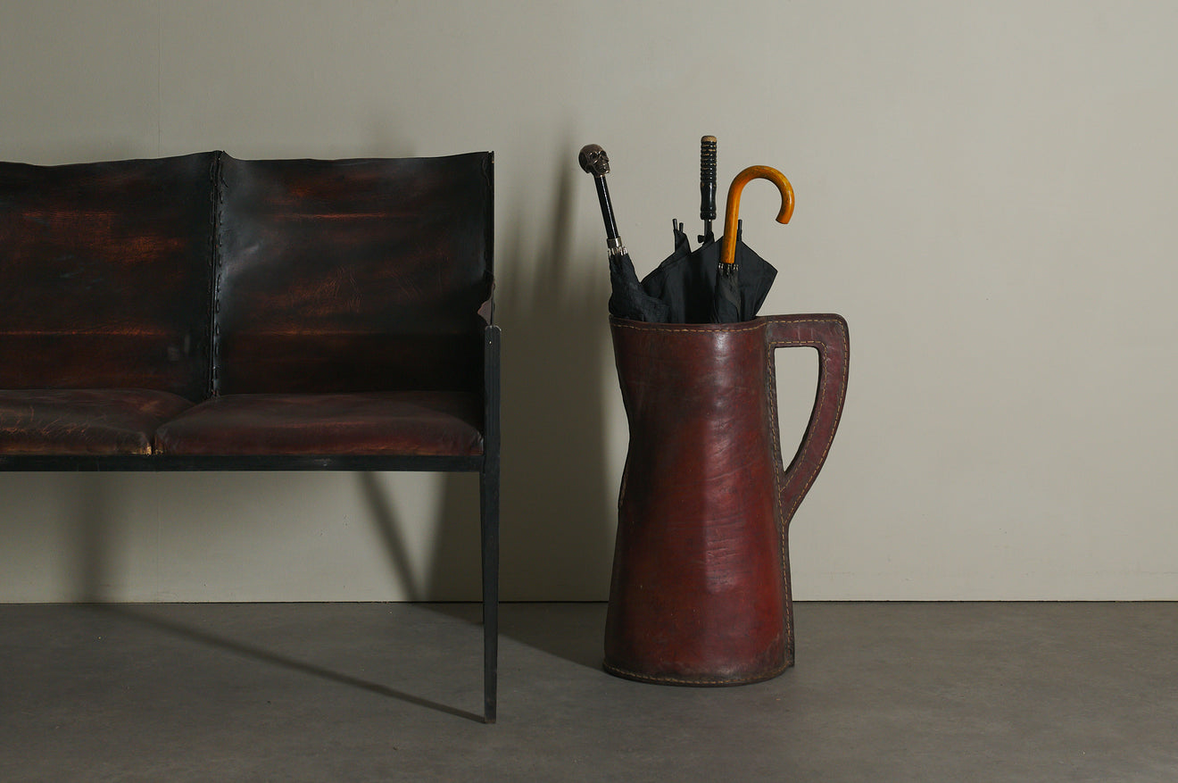 LEATHER STITCHED UMBRELLA STAND IN THE MANNER OF ADNET